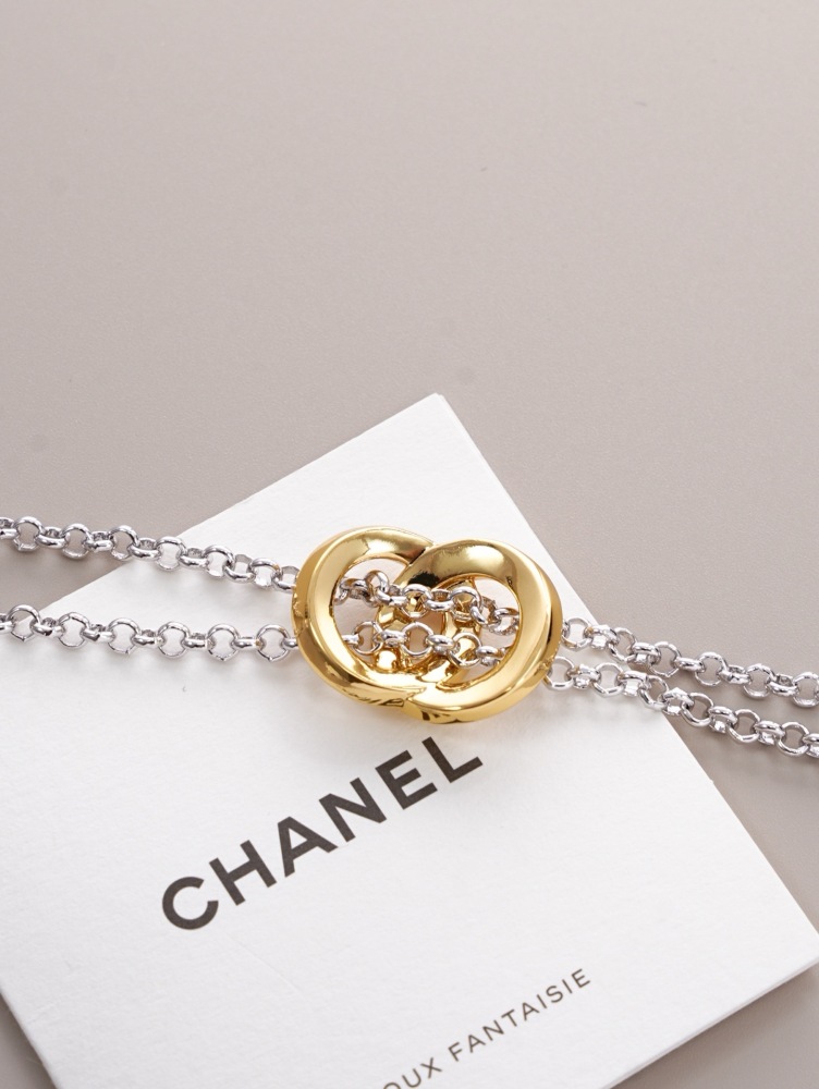 CHANEL TWO‑TONE INTERLOCKING DOUBLE‑RING DOUBLE CHAIN BRACELET