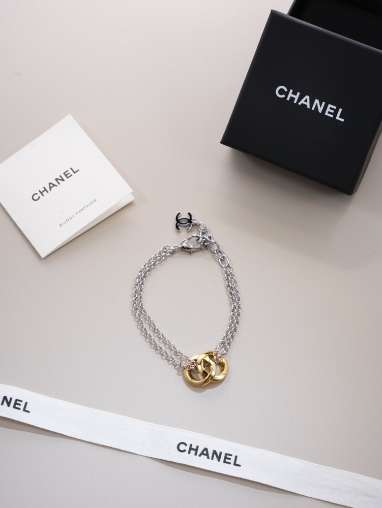 CHANEL TWO‑TONE INTERLOCKING DOUBLE‑RING DOUBLE CHAIN BRACELET