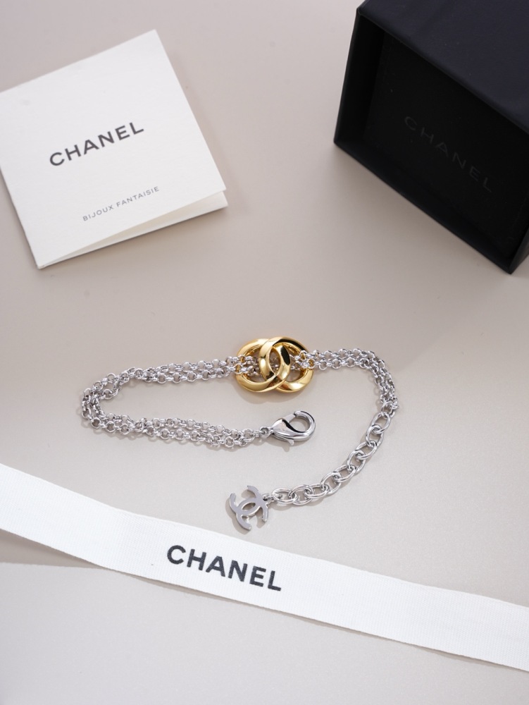 CHANEL TWO‑TONE INTERLOCKING DOUBLE‑RING DOUBLE CHAIN BRACELET