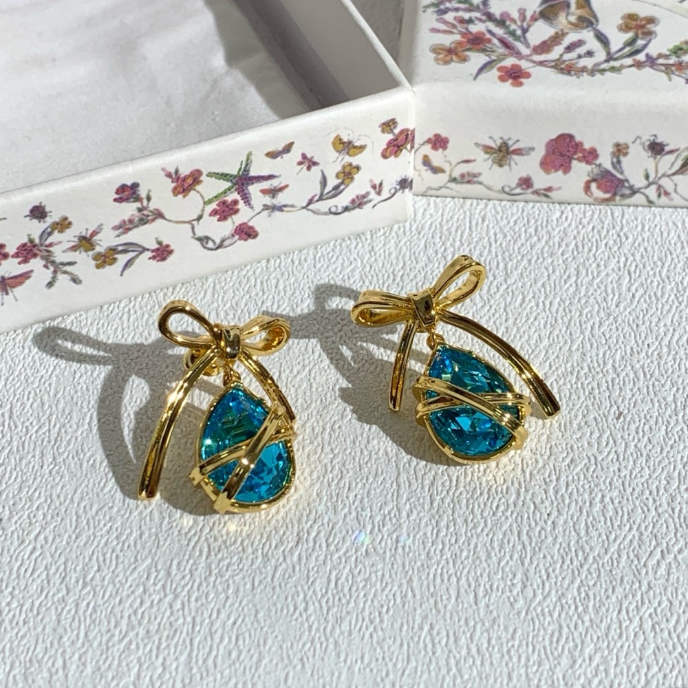 DIOR BOW TEARDROP CRYSTAL DROP EARRINGS, GOLD-TONE WITH AQUA BLUE STONE