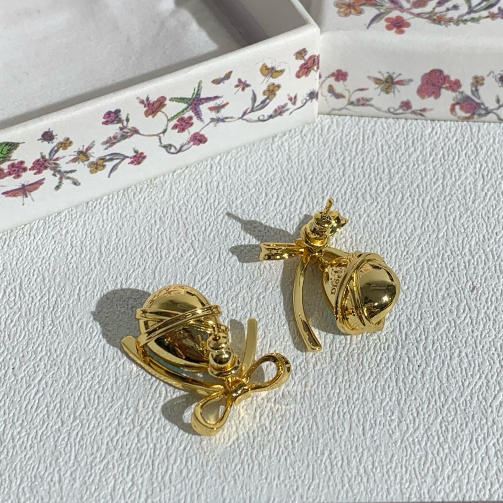 DIOR BOW TEARDROP CRYSTAL DROP EARRINGS, GOLD-TONE WITH AQUA BLUE STONE
