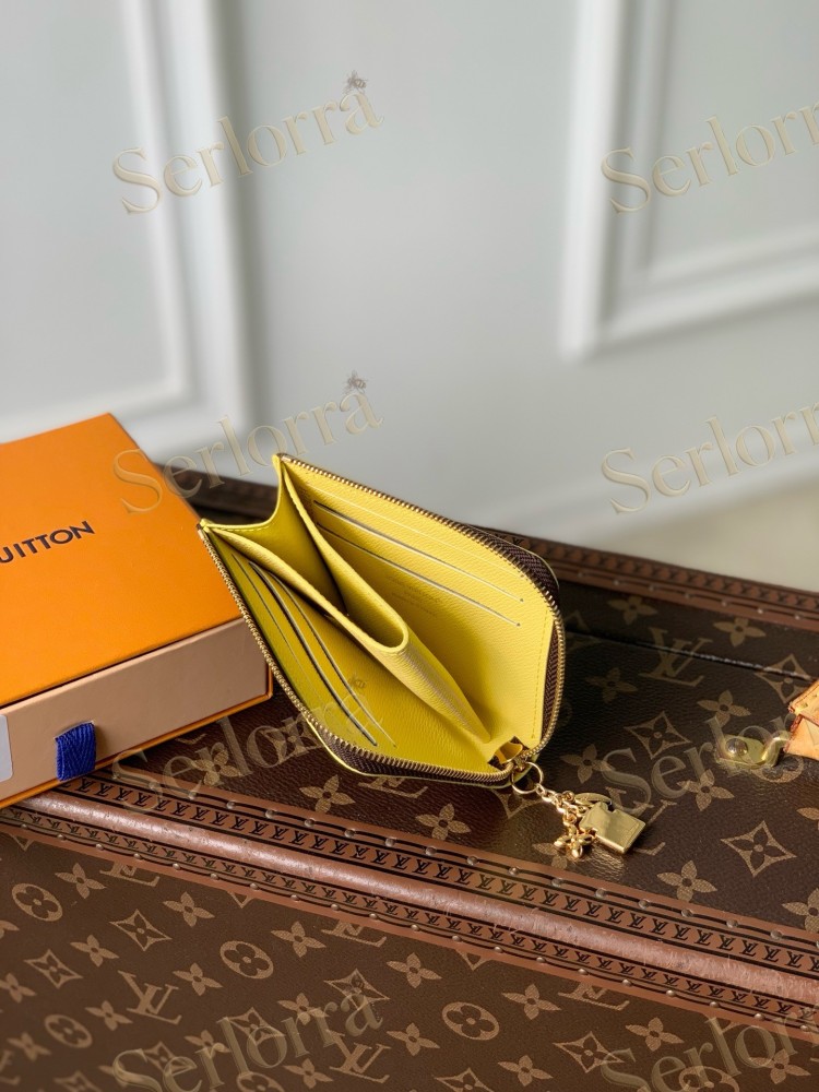 LOUIS VUITTON MONOGRAM CANVAS ZIPPY COIN PURSE WITH LOCK CHARM