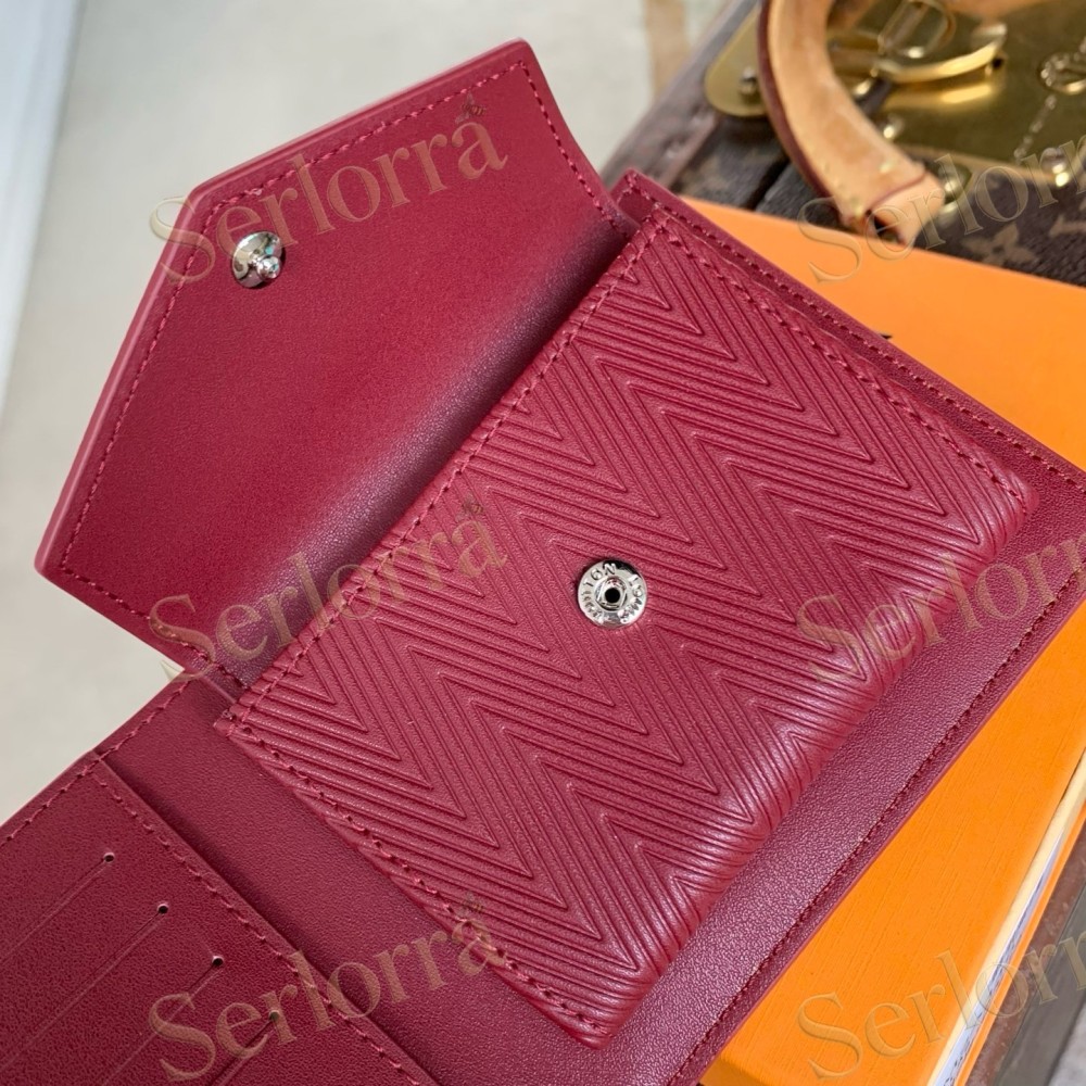 LOUIS VUITTON LIGHT‑BLUE SMOOTH LEATHER BIFOLD WALLET