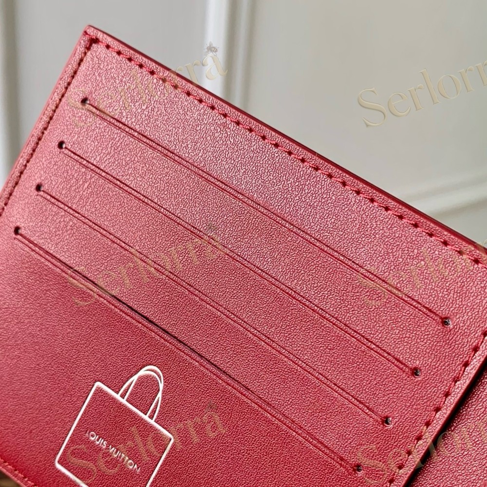 LOUIS VUITTON LIGHT‑BLUE SMOOTH LEATHER BIFOLD WALLET