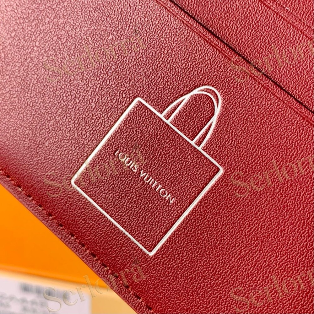 LOUIS VUITTON LIGHT‑BLUE SMOOTH LEATHER BIFOLD WALLET