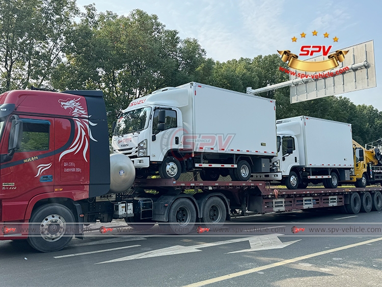 2 Units of Chiller Van Trucks ISUZU Loaded Onto Flatbed Truck