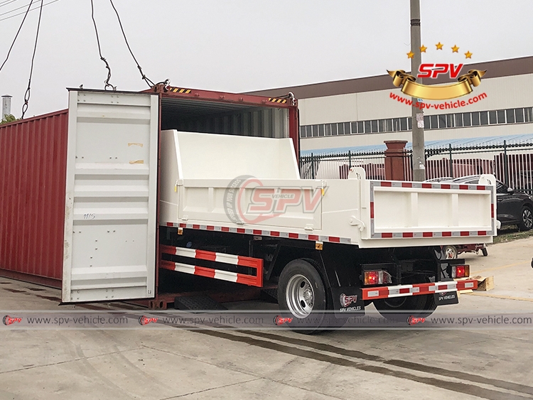 ISUZU 100P Dump Truck Loading Into Container