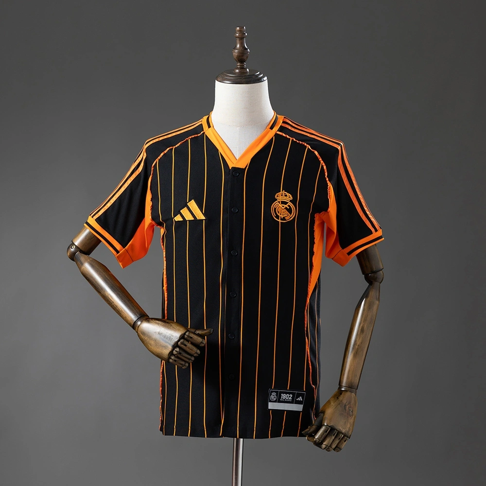 2025-26 REAL MADRID BLACK AND ORANGE US PACK FAN VERSION