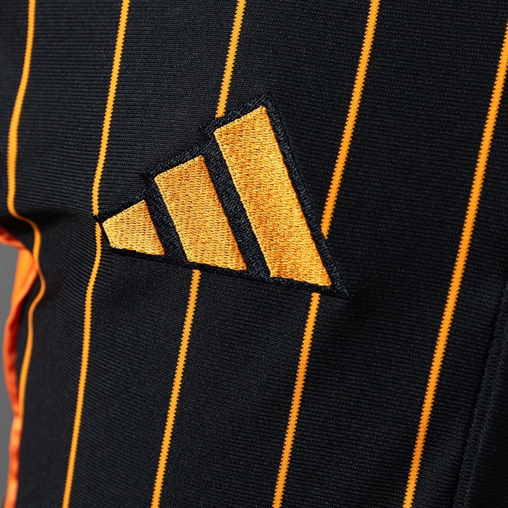 2025-26 REAL MADRID BLACK AND ORANGE US PACK FAN VERSION
