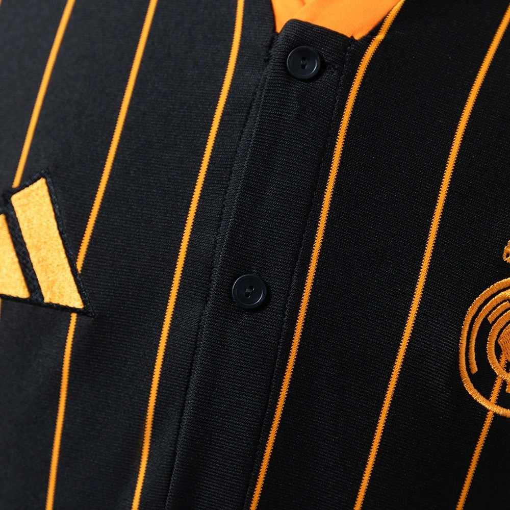 2025-26 REAL MADRID BLACK AND ORANGE US PACK FAN VERSION