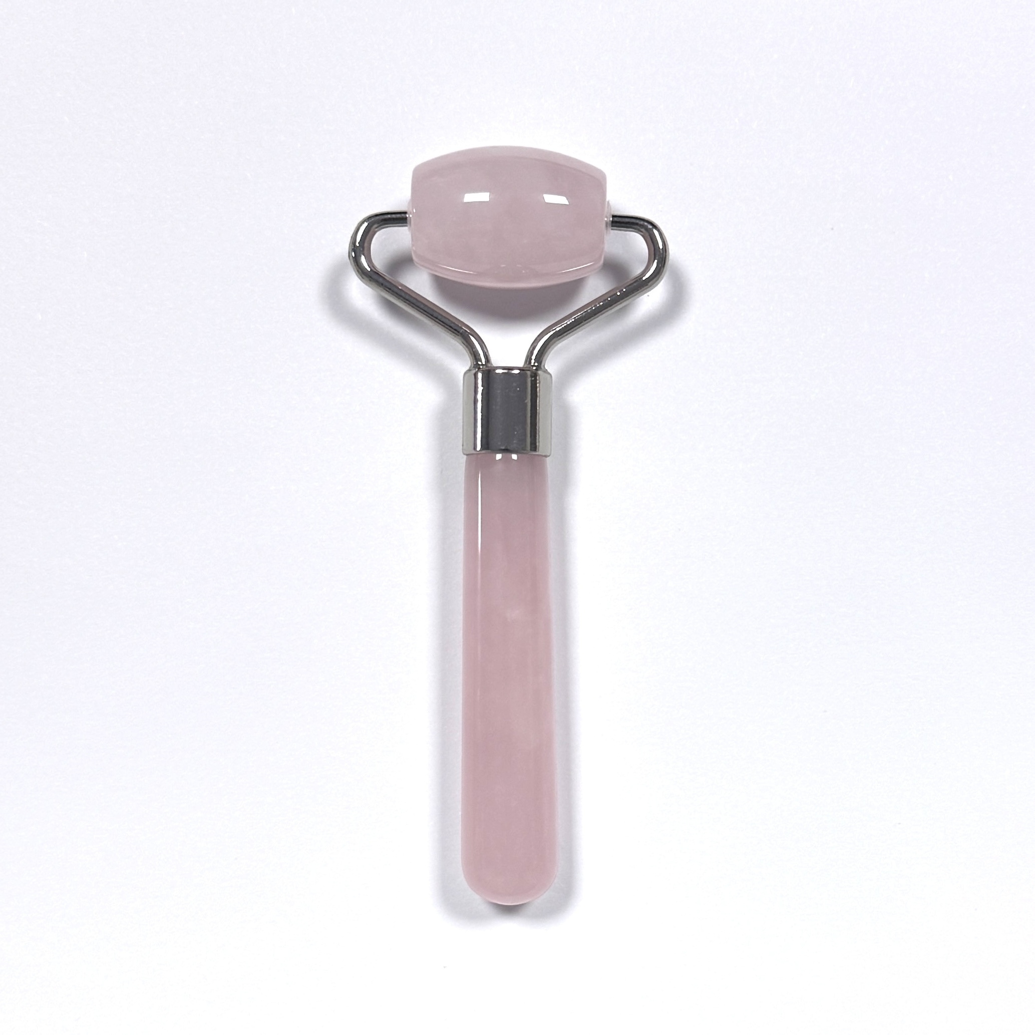 Masajeador de ojos mini de cuarzo rosa