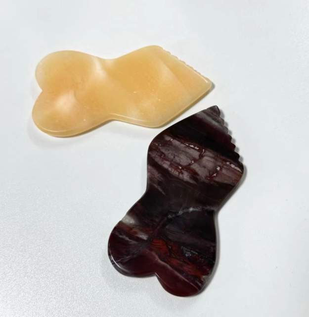 China factory wholesale  lymphatic drainage 100% Natural Authentic Gemstone Bone Shape Serrated Gua Sha Stone Body Massage Scraping Board