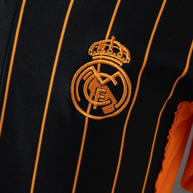 2025-26 REAL MADRID BLACK AND ORANGE US PACK FAN VERSION