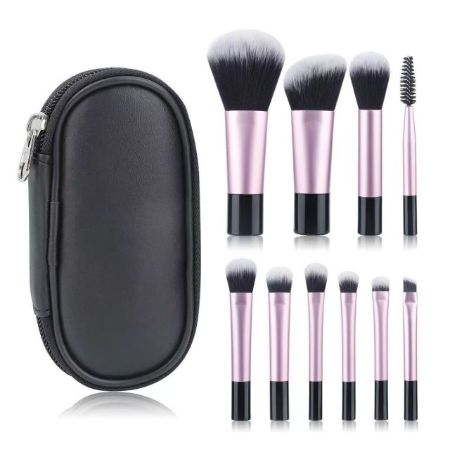 Makeup brush set with crystal handle, including powder brush, contour brush, blush brush, and eyeshadow brush. 10 brushes in a portable set.