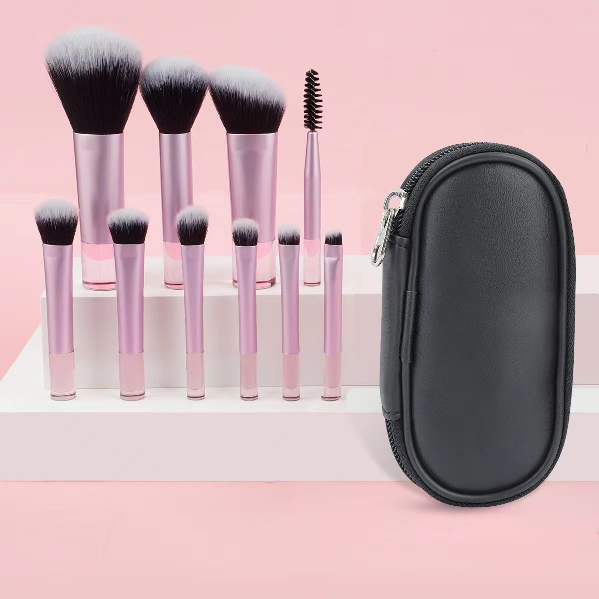 Makeup brush set with crystal handle, including powder brush, contour brush, blush brush, and eyeshadow brush. 10 brushes in a portable set.