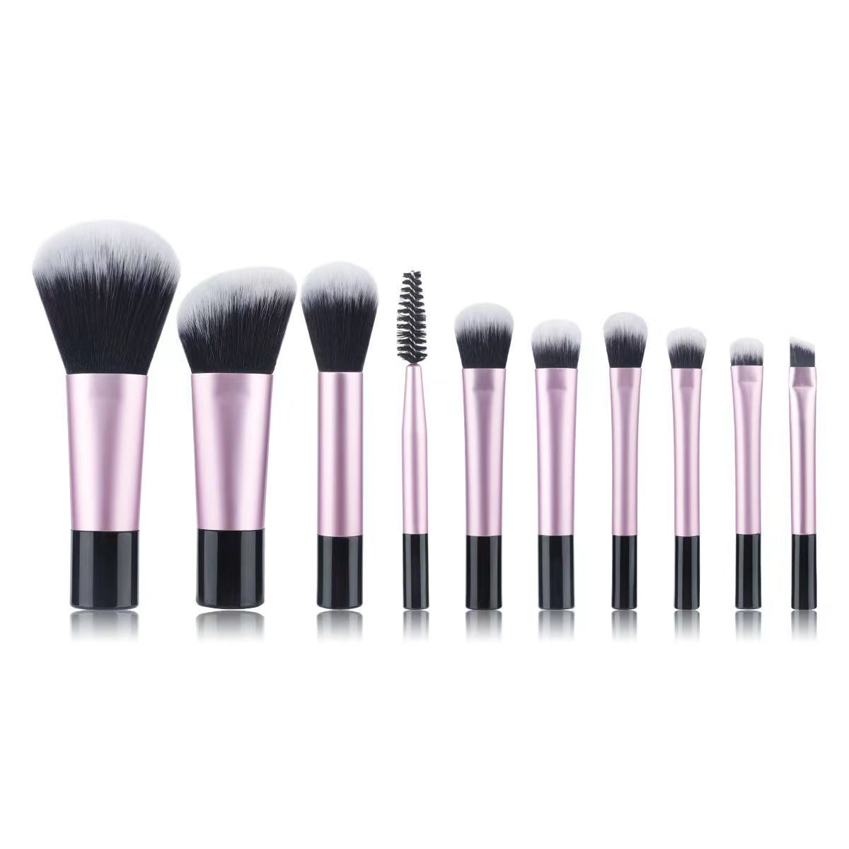 Makeup brush set with crystal handle, including powder brush, contour brush, blush brush, and eyeshadow brush. 10 brushes in a portable set.