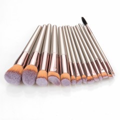 10-piece and 14-piece champagne gold makeup brush set, including blush, eyeshadow, eyebrow brushes, contour brushes, and powder brushes. In stock.