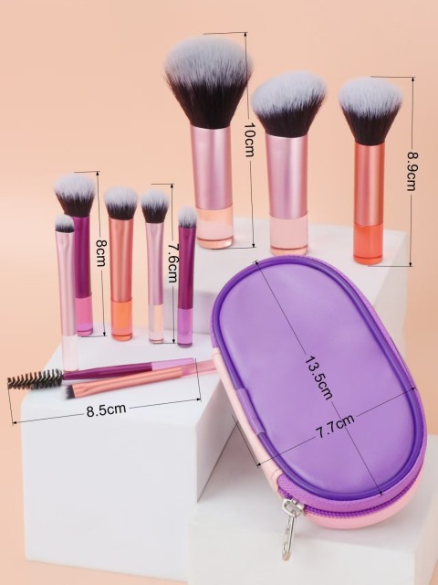 Makeup brush set with crystal handle, including powder brush, contour brush, blush brush, and eyeshadow brush. 10 brushes in a portable set.