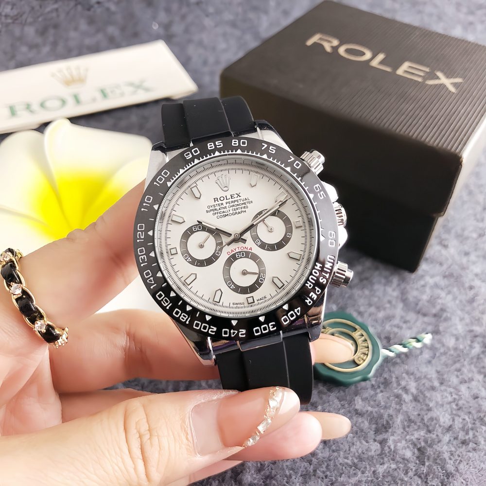 Rolex chronograph movement, original buckle, rubber strap