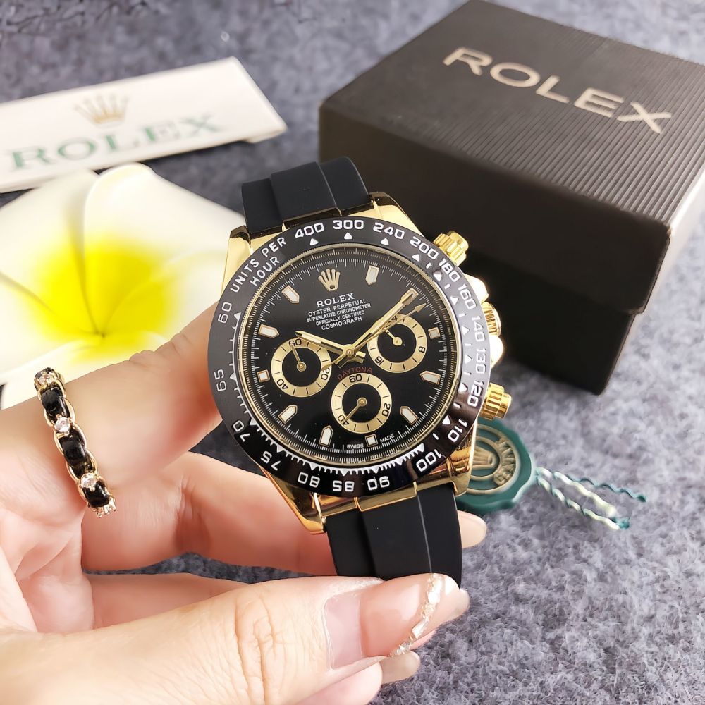 Rolex chronograph movement, original buckle, rubber strap