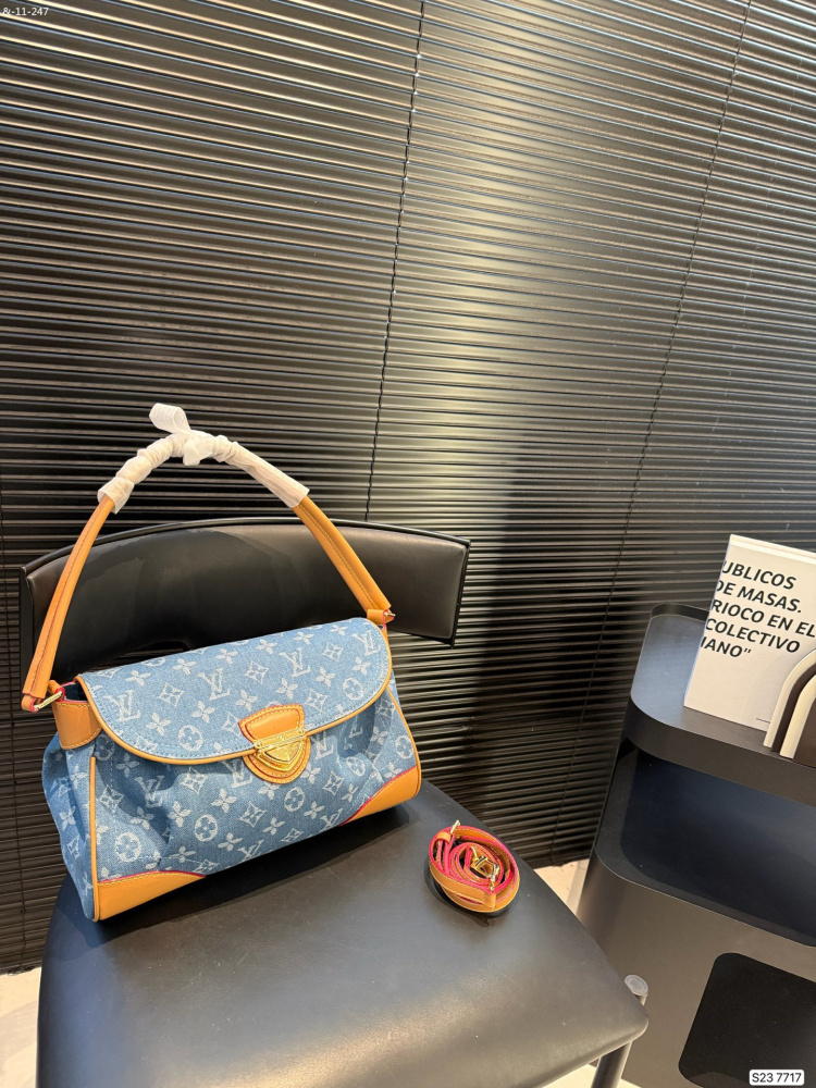 Louis Vuitton women's denim shoulder and armpit handbag