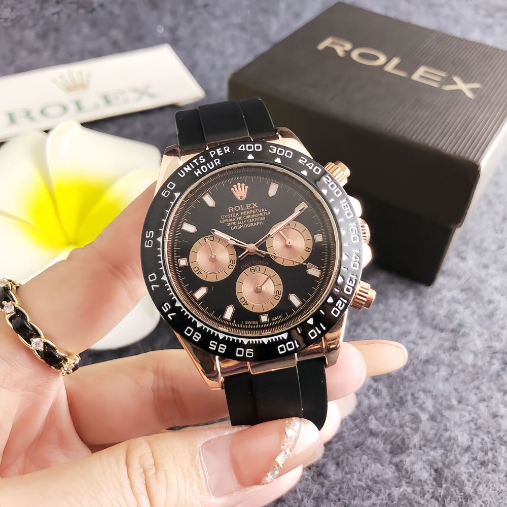 Rolex chronograph movement, original buckle, rubber strap