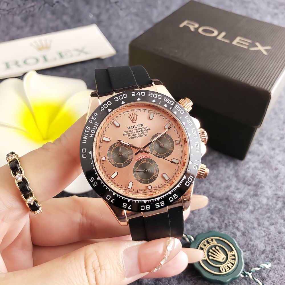 Rolex chronograph movement, original buckle, rubber strap