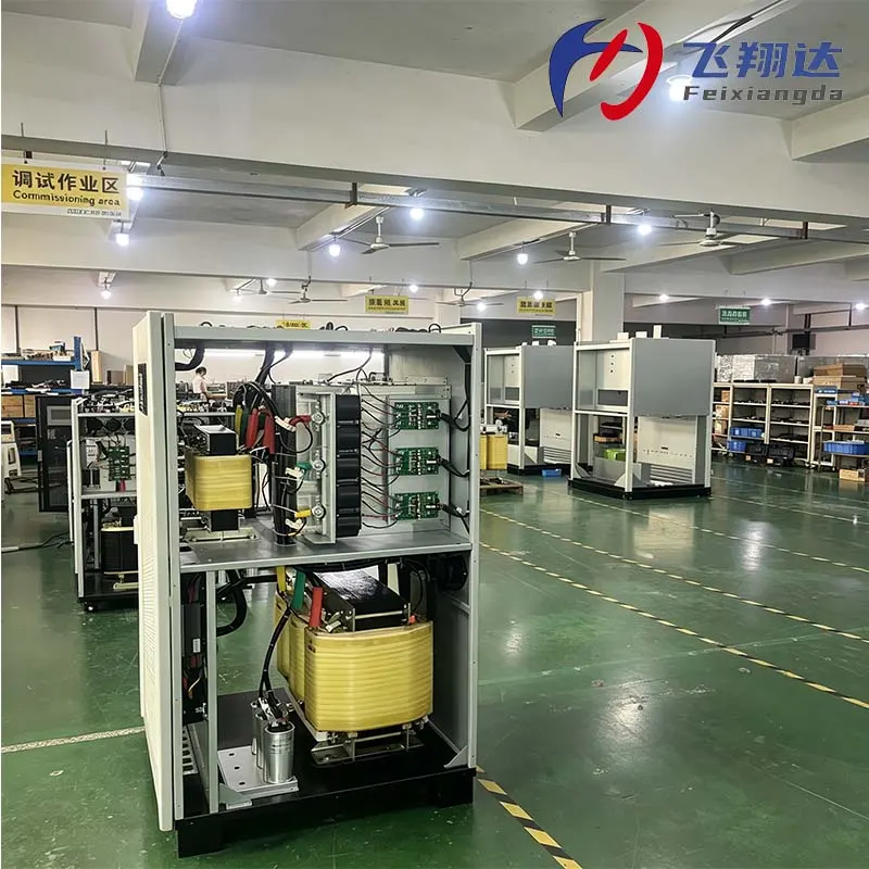 Feixiangda-supplied workshop photograph showing industrial UPS equipment during assembly