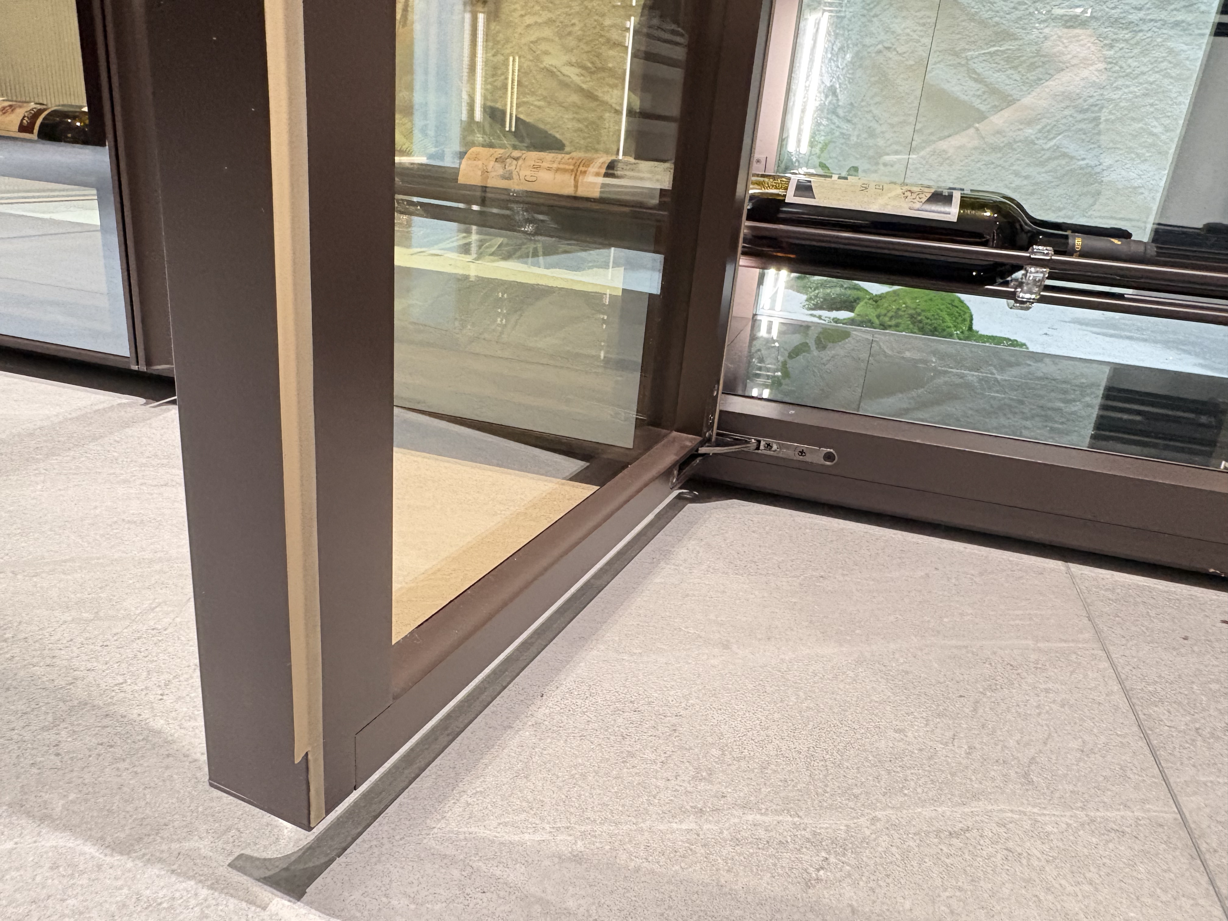 Column-supported Glass Wine Cabinet