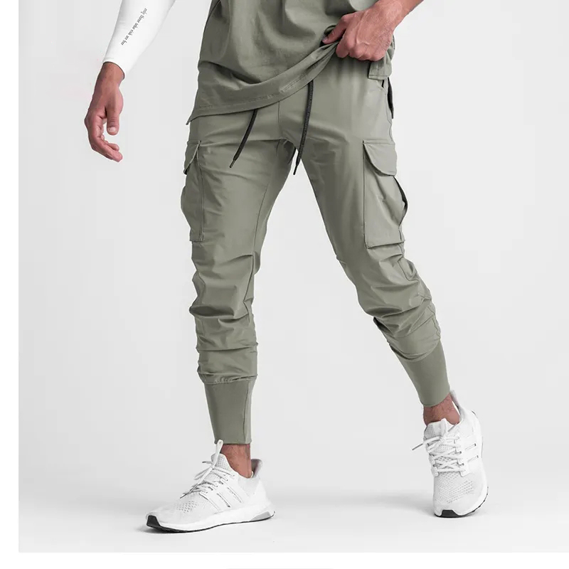 Custom High Quality Blank Polyester Sports Gym Activewear Fitness Slim Fit Nylon Skinny Mens Sweatpants Joggers Wtih Pockets