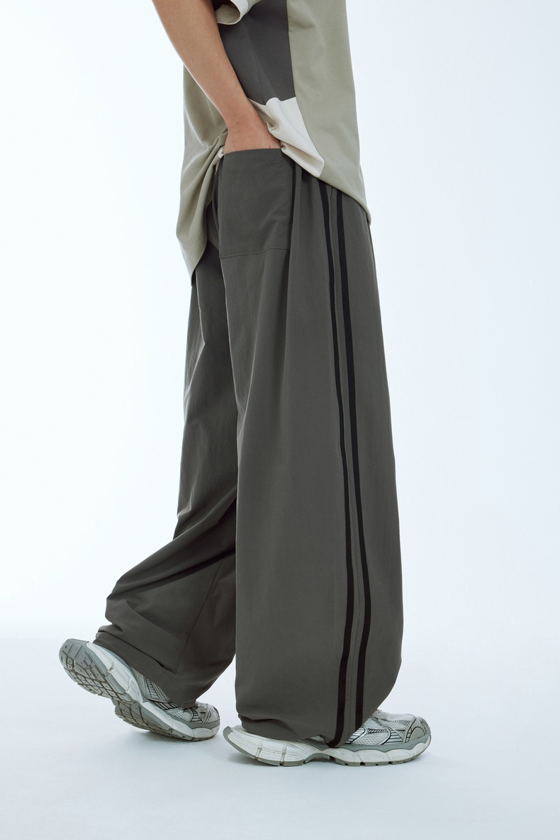 Custom Logo Streetwear Pants Polyester Stitching Loose Elastic Waistband Sweatpants Men'S Trousers Nylon Track Pants