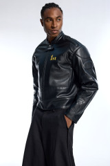 Custom Vintage Black Leather Jacket - Padded Shoulder & Embossed Sleeve Detail