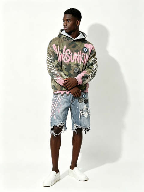 Custom Camo Pink Splash Paint Distressed Cropped Hoodie & Multi-Rip Raw Hem Denim Short Two Piece Matching Set Manufacturer | Men Rhinestone Oval Patch Cursive Embroidery Oversized Grunge Streetwear Co-Ord Private Label, 50 MOQ, 7-Day Sample & 15-Day Bulk
