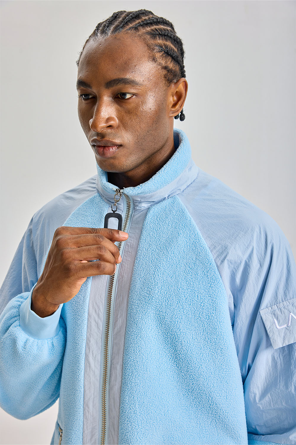 Custom Baby Blue Hybrid Fleece Nylon Raglan Jacket | Men Stand‑Collared Mixed Fabric Zip‑Up Streetwear Jacket With Zipper Pockets