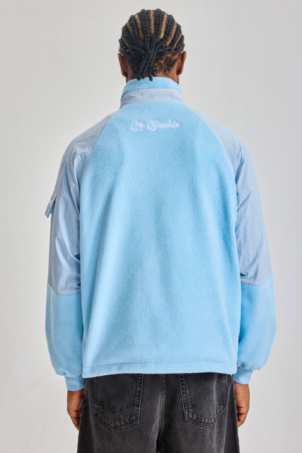 Custom Baby Blue Hybrid Fleece Nylon Raglan Jacket | Men Stand‑Collared Mixed Fabric Zip‑Up Streetwear Jacket With Zipper Pockets