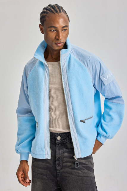 Custom Baby Blue Hybrid Fleece Nylon Raglan Jacket | Men Stand‑Collared Mixed Fabric Zip‑Up Streetwear Jacket With Zipper Pockets
