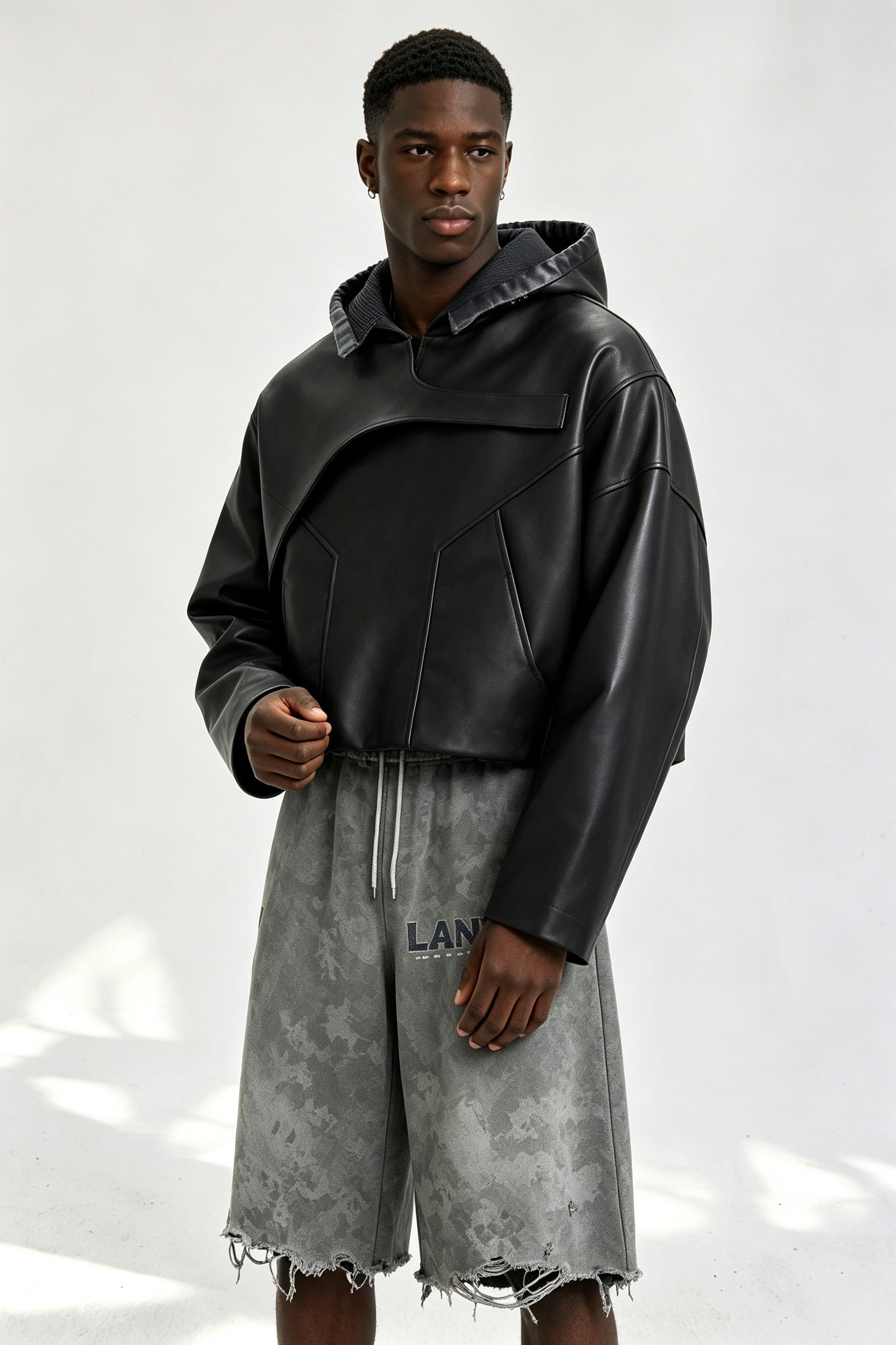 Custom Men Asymmetric Panel Faux Leather Hoodie, Cropped Black Streetwear PU Hooded Jacket