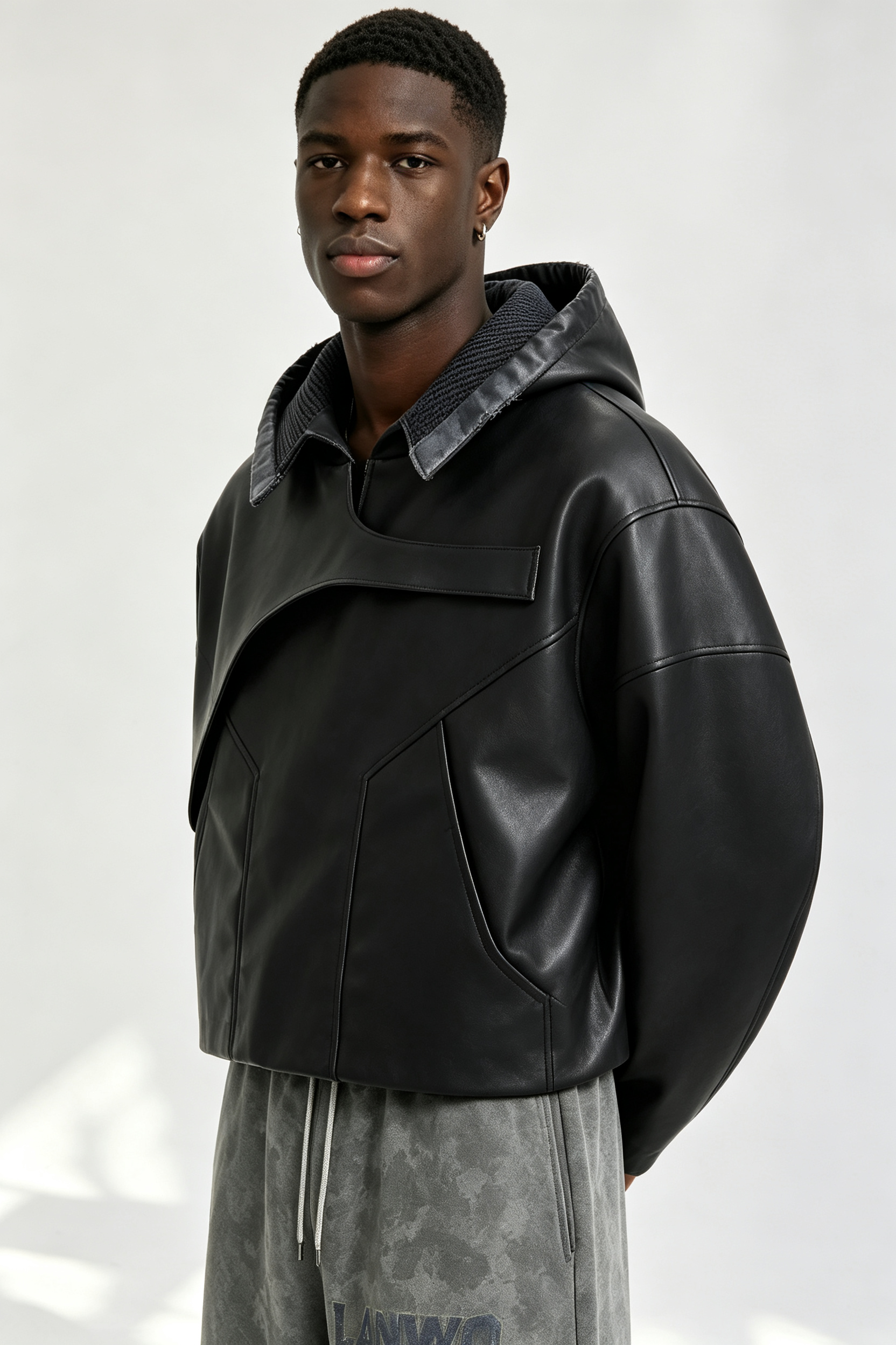 Custom Men Asymmetric Panel Faux Leather Hoodie, Cropped Black Streetwear PU Hooded Jacket