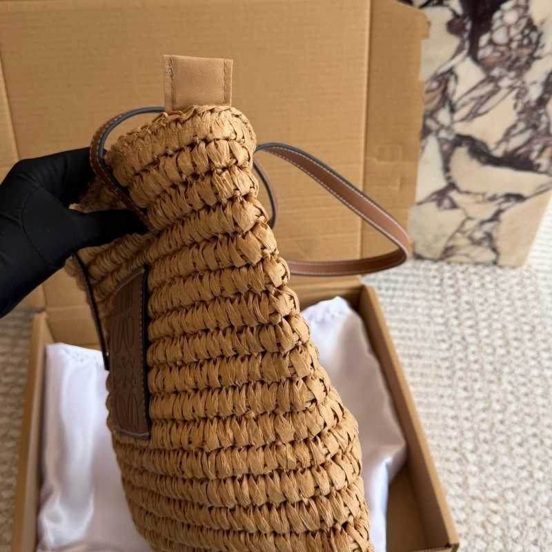 Summer is here, and you’re still not rocking this stunning straw bag-box