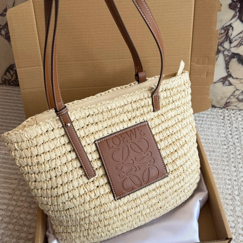 Summer is here, and you’re still not rocking this stunning straw bag-box