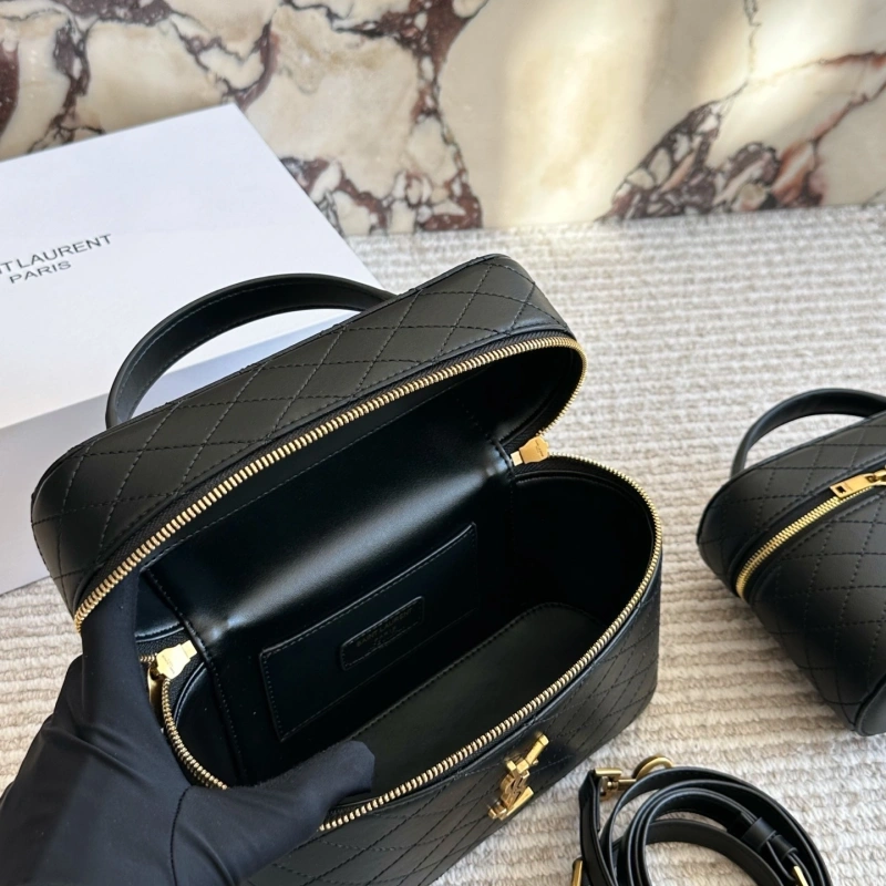 It can be carried by hand or worn crossbody, and it’s very comfortable to wear-box