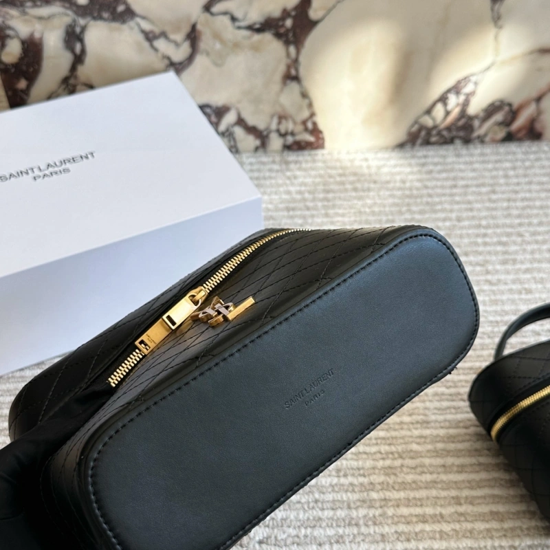 It can be carried by hand or worn crossbody, and it’s very comfortable to wear-box