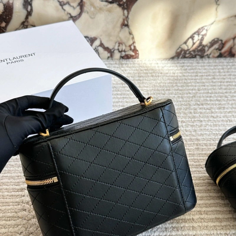 It can be carried by hand or worn crossbody, and it’s very comfortable to wear-box