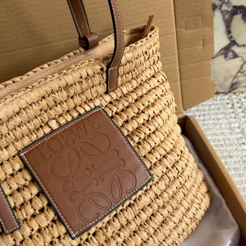 Summer is here, and you’re still not rocking this stunning straw bag-box