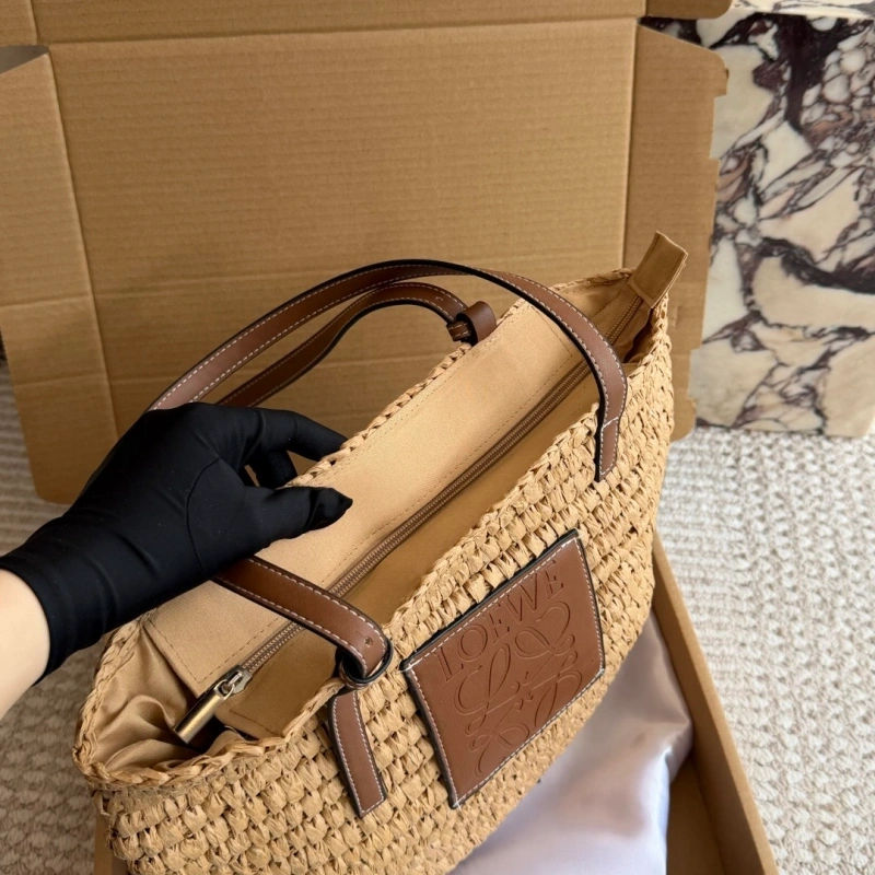 Summer is here, and you’re still not rocking this stunning straw bag-box