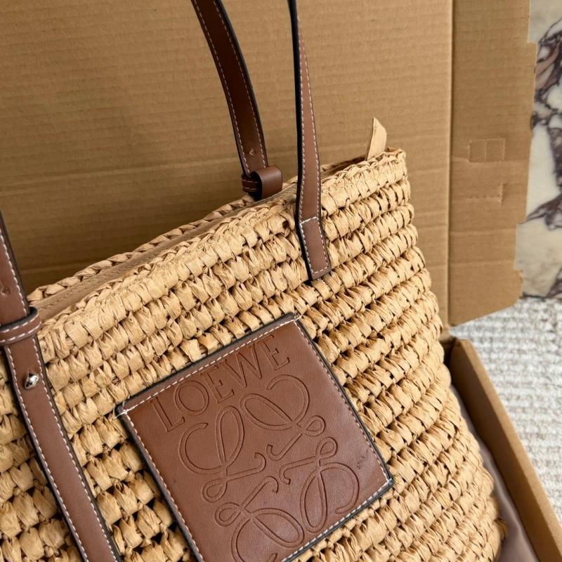 Summer is here, and you’re still not rocking this stunning straw bag-box