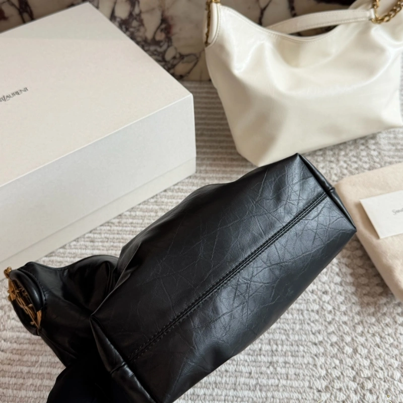 Classic black tone meets the iconic Y-signature V-shaped quilting-box