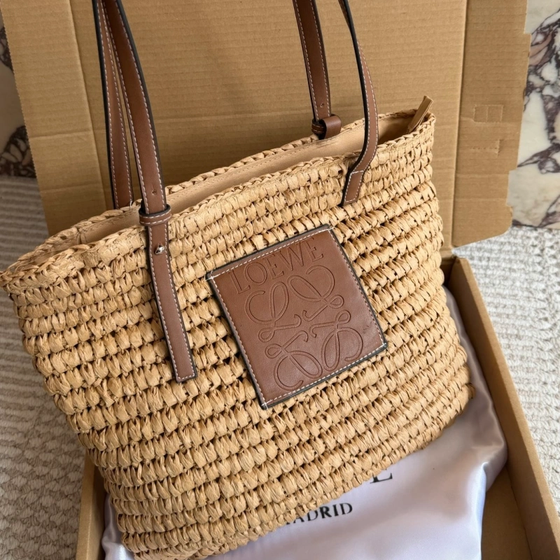 Summer is here, and you’re still not rocking this stunning straw bag-box