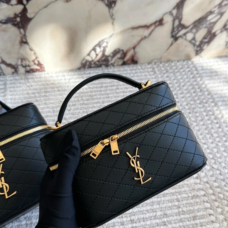 It can be carried by hand or worn crossbody, and it’s very comfortable to wear-box