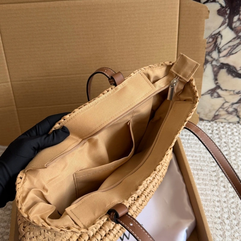 Summer is here, and you’re still not rocking this stunning straw bag-box